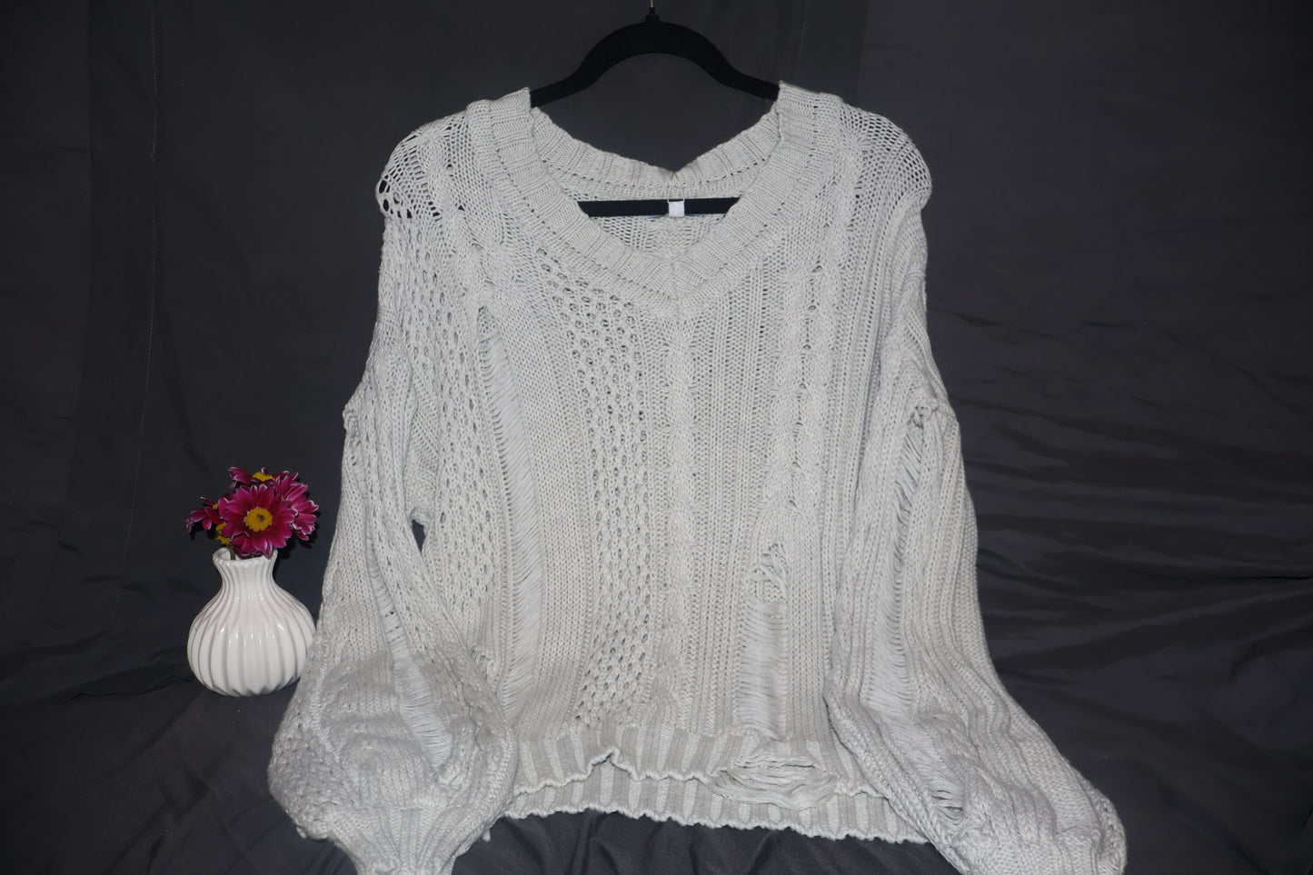 Long sleeve drop shoulder V-neck knitted sweater